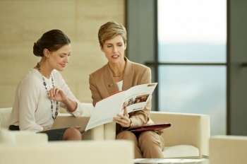 female financial advisor consulting with client